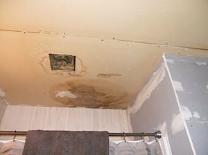 drywall ceiling with stains