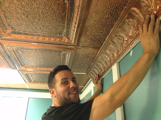 installer adds a cornice